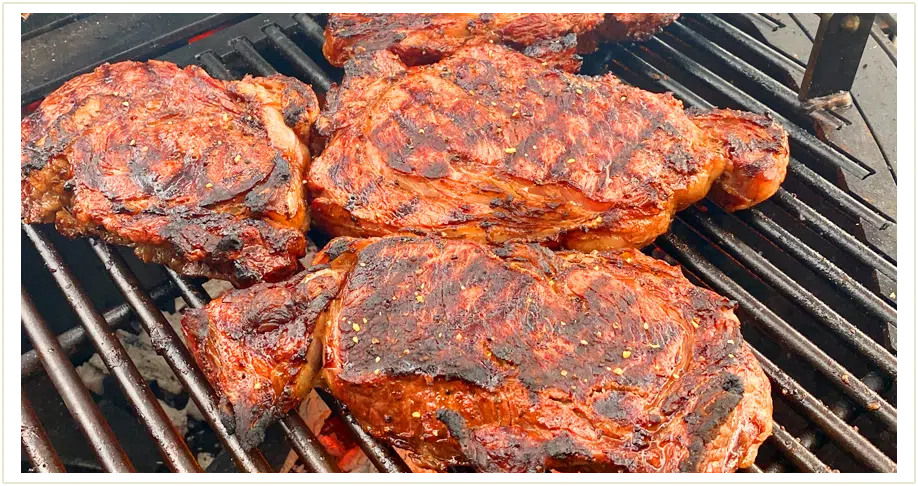 Several steaks being grilled, to the left another image of a gather grill and to the right four people eating food by a gather grill.